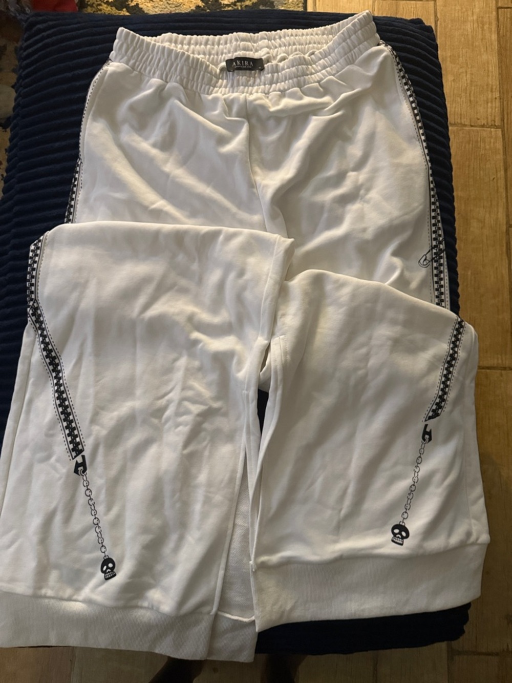 AKIRA White Track Joggers with Black Zip-Print Accent